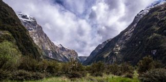 Essential New Zealand Travel Apps Mountain Valley on Milford Track, New Zealand