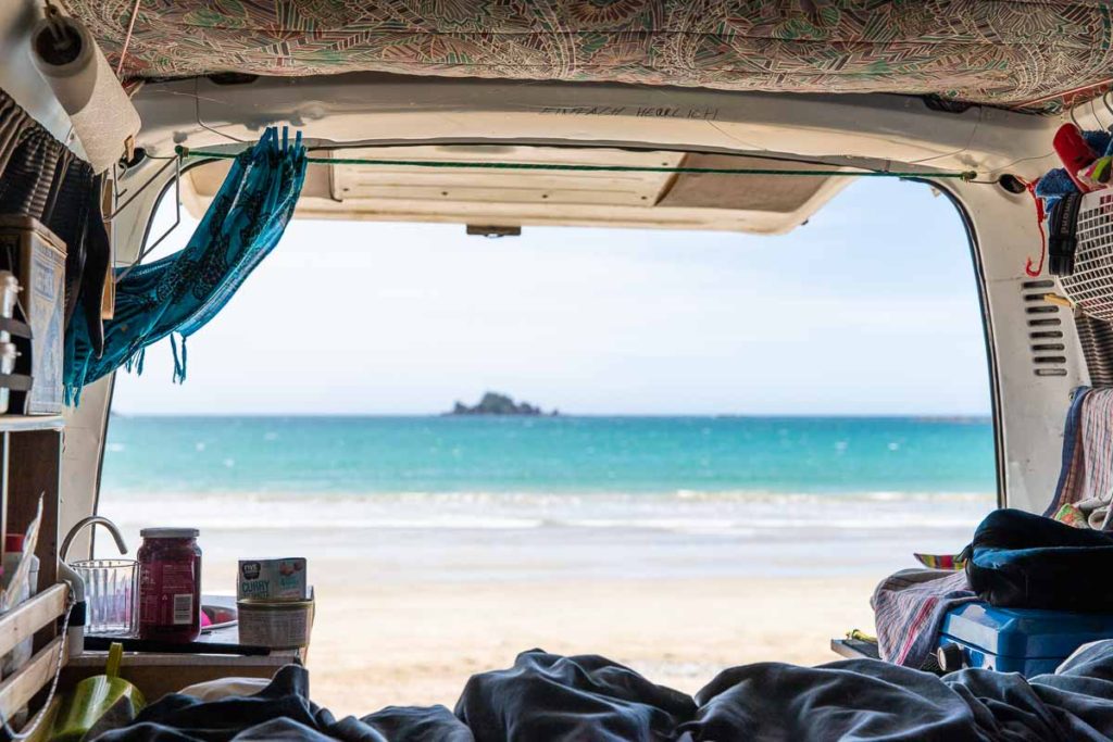 View of beach from inside van, New Zealand